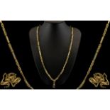An Excellent Quality and Solid 9ct Gold Byzantine and Block Design Impressive and Heavy Long Chain.