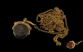 Large Antique Muff Chain and Fob in yellow metal; long guard chain in 'pinchbeck gold', with
