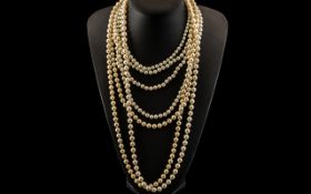 Collection of Faux Pearls, four necklaces in total, to include silver clasps.