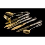 Five French Silver Fruit Knives with embossed hilts and gilded blades,