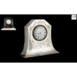 Edwardian Silver Miniature Dressing Table Clock with a white enamel dial and Swiss movement;