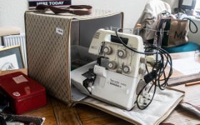 Sewing Machine Bernette 334DS, with overlocker, in carry case, with box of accessories.