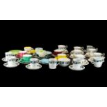 Royal Stuart Harlequin Tea Set, comprising four cups, saucers and side plates in yellow, pink,