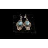 Larimar Long Drop Earrings, two solitaire, oval cabochon cuts of larimar, the beautiful, rare, sea