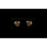 Diamond Triple Knot Stud Earrings, an attractive design set with baguette cut diamonds of good