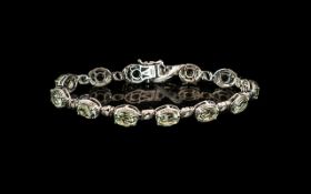 Green Amethyst Tennis Bracelet, 12 oval cut sparkling, mint green amethysts, also called prasiolite,