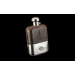A Jumbo Size Gentleman's Silver Plated Hip Flask, with a leather clad body, maker's name to top J