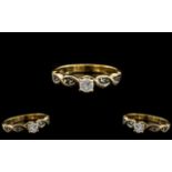 18kt Gold Diamond Ladies Ring with small diamonds to the shank and to the centre; weight 2.