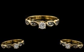 18kt Gold Diamond Ladies Ring with small diamonds to the shank and to the centre; weight 2.