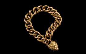 Antique Period - Attractive Rose Gold Curb Bracelet with Ornate Embossed Padlock.