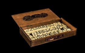 Scrimshaw: Set of Antique Ebony and Bone Dominos, 28 pieces,