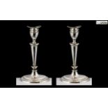 Pair of Silver Candlesticks in the Adams style, London 1906, maker TB and S; 7.5 inches (18.