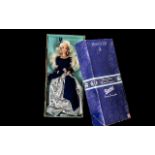 Vintage Boxed Avon Barbie Doll ' Winter Velvet' Barbie wearing blue velvet and silver,