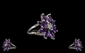 Deep Purple Amethyst Cluster Ring, eight marquise cut amethysts, totalling 4cts, form an elongated,