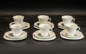 A Shelley Style White Porcelain Tea Set, comprising of six cups, saucers and side plates.