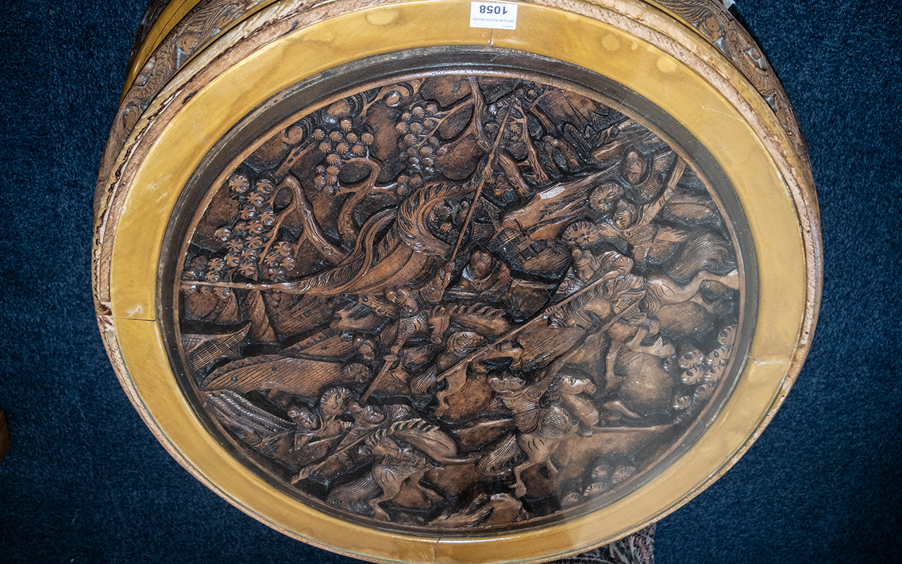 An Oriental Round Circular Nest of Tables of Circular Form, A Glass Top Above a Carved Fighting - Image 2 of 2