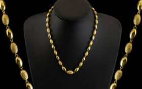 Ladies 9ct Gold Attractive Baubles Necklace with Screw Clasp.