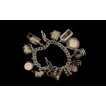A Vintage Sterling Silver Charm Bracelet - Loaded with Excellent Silver Charms,