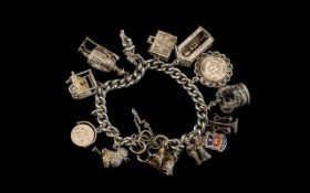 A Vintage Sterling Silver Charm Bracelet - Loaded with Excellent Silver Charms,