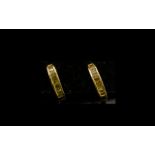 Yellow Diamond J-Hoop Earrings, baguette cut yellow diamonds, channel set down the front of the j-