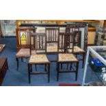 A Harlequin Set of Five Edwardian Mahogany Bedroom Chairs, with embroidered seats, terminating on