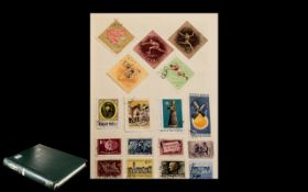 Green Spring Back Stamp Album of Hungary & Ifni. Mostly 1950s onwards. Well stocked.