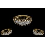 14ct Gold Attractive Contemporary Design 7 Stone Diamond Set Ring.