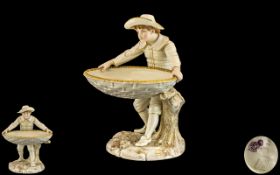 Royal Worcester - James Hadley Designed Hand Painted Boy Figure Holding a Large Basket Weave