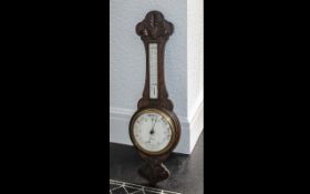 Oak Cased Aneroid Barometer by J J Lockwood of Preston, with thermometer,