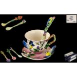 Collection of Franz Porcelain, to include a cabinet cup, saucer and spoon, design FZ00038,