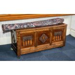 Reproduction Carved Oak Mule Chest with a Three Paneled Lift up Lid and Parcels to the Front.. 53