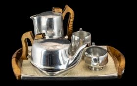 Art Deco Style Picquot Ware Tea Set, comprising a Tea Pot, Hot Water Pot, Milk Jug and Sugar bowl,