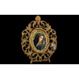 Ormalu framed Plaque of the Madonna. On stand, measures 11" tall.