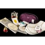 Christian Dior Collection - comprising: Dior plum coloured make-up bag with zip and short handle