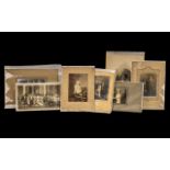 A Set of Six Mounted Plus one unmounted black and white photographs.