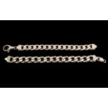 A Superior Quality - Sterling Silver Pair of Heavy Well Made Curb Bracelets with Strong Clasp.