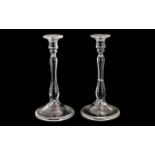 Pair of Glass Candlesticks with a Fold Over Foot, Supported on a Baluster Stem. 10 Inches High. 20th