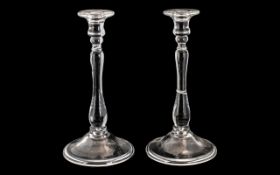 Pair of Glass Candlesticks with a Fold Over Foot, Supported on a Baluster Stem. 10 Inches High. 20th