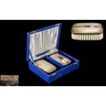 Pair of Silver Backed Clothes Brushes and Comb - Boxed.