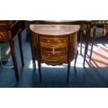 A French Demi Lune Two Drawer Inlaid Commode, chest of traditional form with small ormolu mounts,
