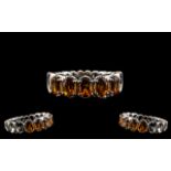 Madeira Citrine Band Ring, five oval cut, deep, warm Madeira citrines totalling 2cts, held within