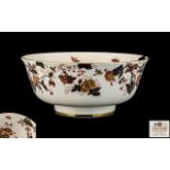 Large Coalport Porcelain Footed Bowl decorated in the Imari palette, highlighted in gilt,
