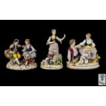 Three German Porcelain Figure Groups, one depicting a shepherdess with her flock, 7 inches (17.
