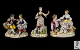 Three German Porcelain Figure Groups, one depicting a shepherdess with her flock, 7 inches (17.