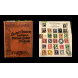 Very old Stanley Gibbons Improved stamp album No. 0 well filled with stamps from around the world.