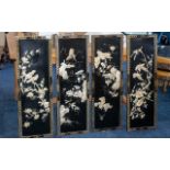 Set of Four Black Lacquered Chinese Wall Panels depicting flowers and birds; 36 inches (90cms) x