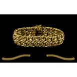 10ct Yellow Gold - Superb Quality Italian Snake Design Bracelet of Wide Proportions.
