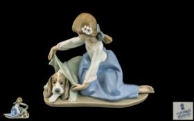 Lladro - Hand Painted Porcelain Figure ' Dogs Best Friend ' Model No 5688. Designer Antonio Ramos.