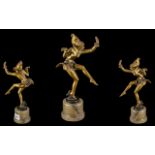 A Cold Painted White Metal Art Deco Period Figure of a Dancing Girl, in the style of Lorenzo, on