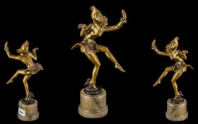 A Cold Painted White Metal Art Deco Period Figure of a Dancing Girl, in the style of Lorenzo, on